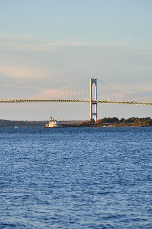 This little white light house is located on Rose Island near Newport Rhode Island. In the background is Claiborne Pell Newport Bridgeの写真素材