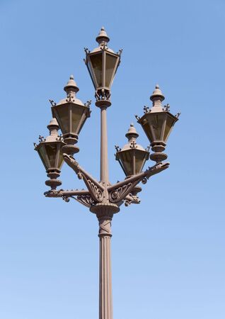 Street-lamp on a blue sky background on a sunny dayの写真素材