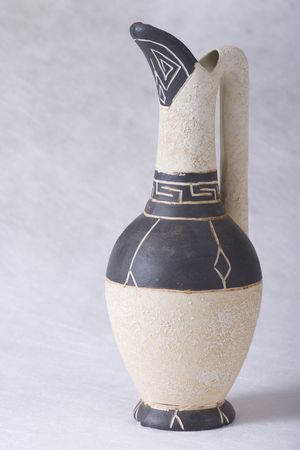 Old-fashioned clay jug with greek ornamentの写真素材