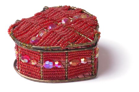 Heart-shaped casket decorated by glass beads isolated on whiteの写真素材