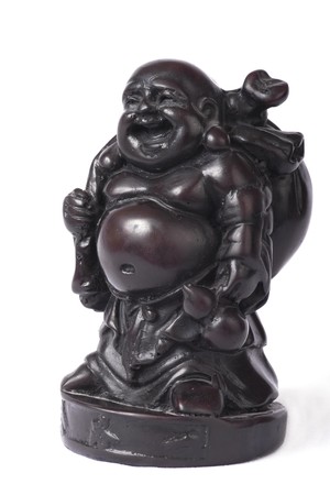 Traditional wooden Chinese god statuette isolated on whiteの写真素材