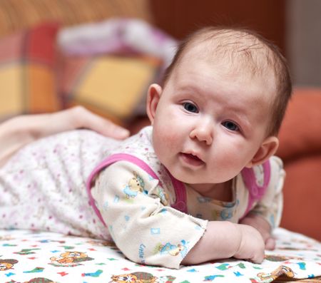 Portrait of a cute baby-girl looking at cameraの写真素材