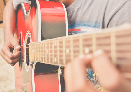 Acoustic guitar playing by an guitarist