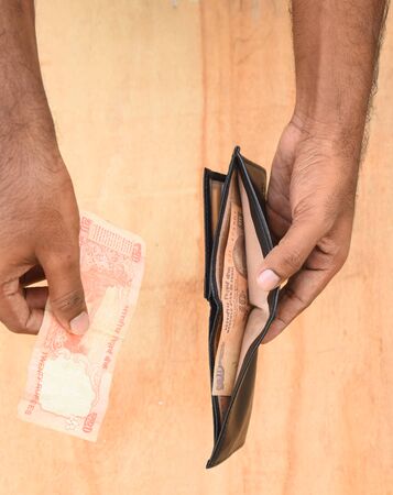 hand holding empty wallet - recessionの写真素材