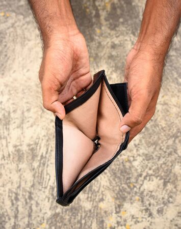 hand holding empty wallet - recessionの写真素材