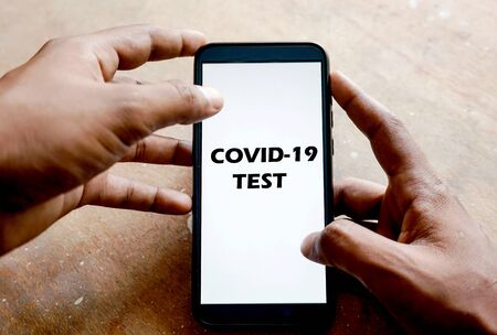 Covid-19 test text on smart phone