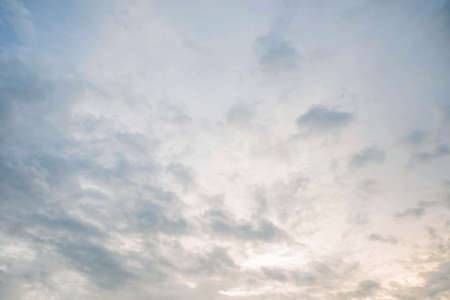Dark and white clouds on blue sky