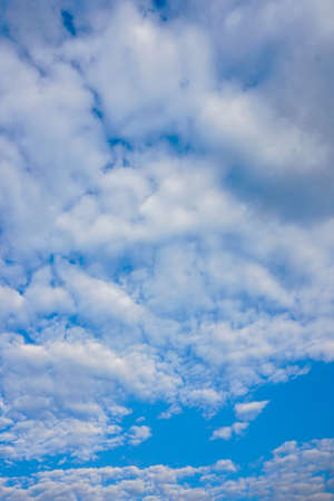 beautiful blue sky with white cloudsの写真素材