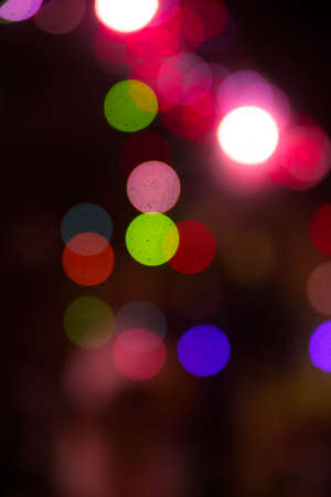 abstract colorful christmas bokeh backgroundの写真素材