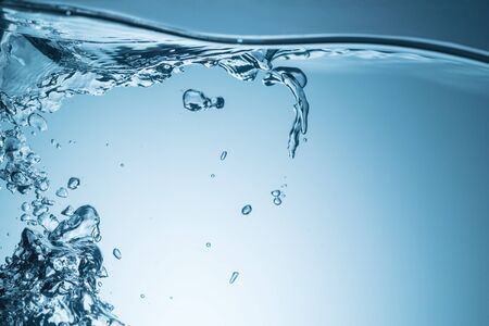 Clear water surface with ripple and bubble