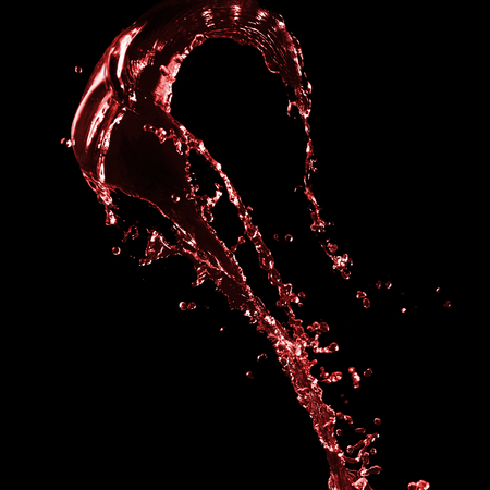 Clear splash of red wine or juice water with drops. Isolated on a blackの写真素材