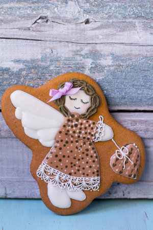 angel girl with a heart on a stick with  sugar glazeの写真素材