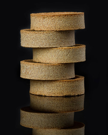 rye flour tart on a black background. Bakery productsの写真素材