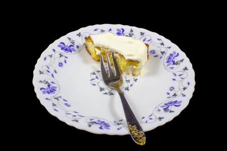 Cottage cheese pudding on a plate with appliancesの写真素材
