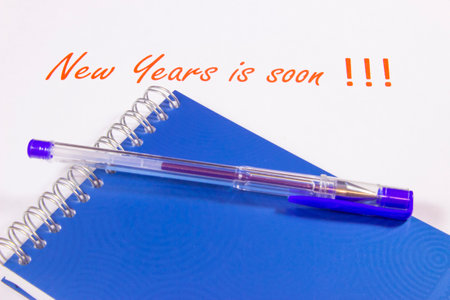 stationery notepad and pen that lie on the table