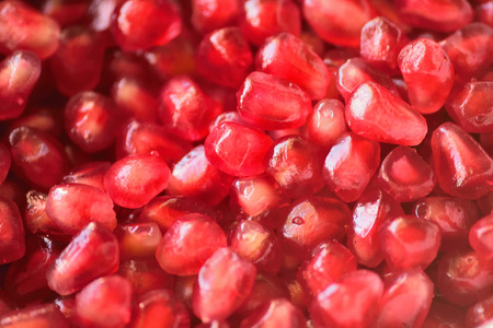 Red Pomegranate seeds arranged as a backgroundの写真素材