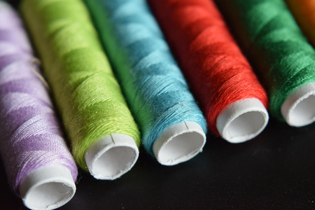 Macro Background of colorful sewing thread