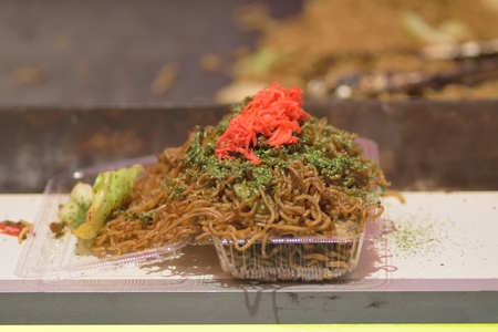 Famous Japanese Street food called Yakisoba being prepared at food stalls in Tokyoの写真素材