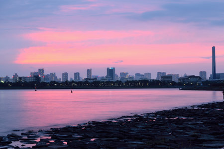 Long exposure Urban landscape of Tokyo, Japan at dusk in Tokyo bayのeditorial素材