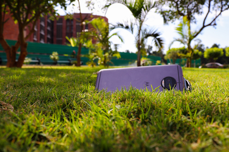 mobile phone kept on the grass and clicked a close up pictureの写真素材