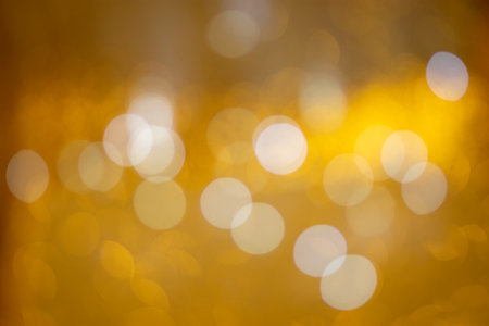 Golden bokeh, blurred background, christmas background.の写真素材