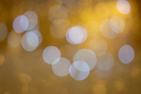 Golden bokeh, blurred background, christmas background.の写真素材
