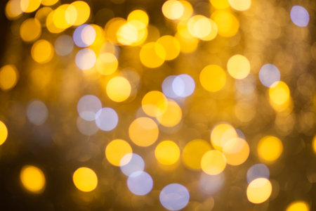 Golden bokeh, blurred background, christmas background.の写真素材