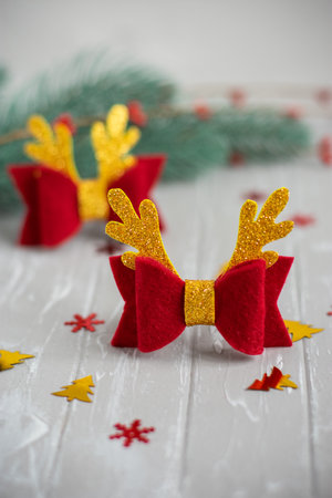 Baby felt hair bows, headbands, clips. Christmas bow. New Year hair accessories. Made of felt.の写真素材