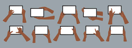 African American hands hold tablet pc in vertical and horizontal positions. African American hands...