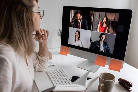 Video conference. Manager hold a business meeting on a computer from home
