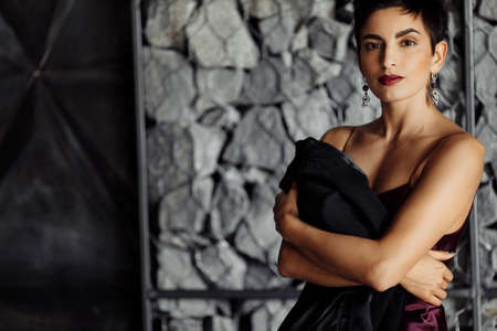Portrait of gorgeous pretty woman. Adorable stylish lady in luxury formal clothing and jewelry,...