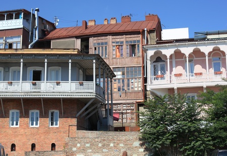 Balconies in  downtown Tbilisi, Georgia exposed to bright sunshine in  summer morning  の写真素材