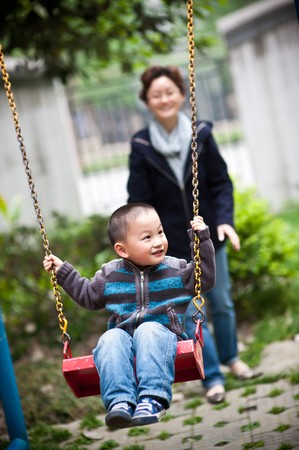 mother and son swingの写真素材