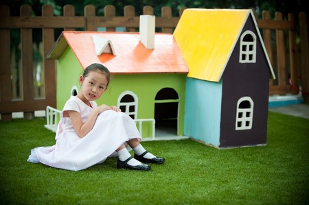 little girl and house like Fairy taleの写真素材