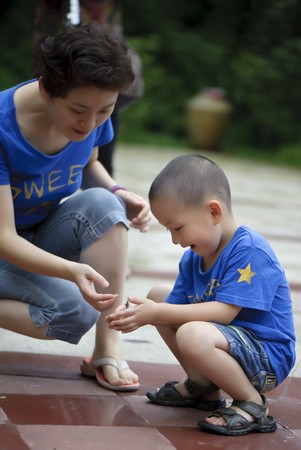 mother and son happy playの写真素材