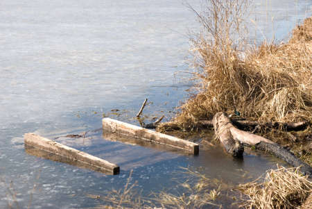Frozen lake in early springの写真素材