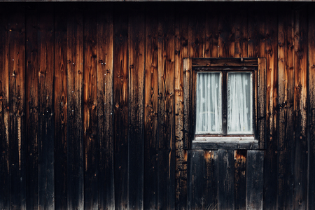 dark wooden interior with windowの写真素材
