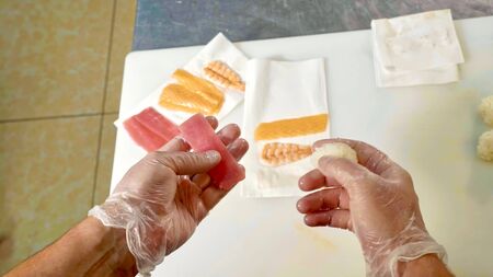 POV professional chef making sushi personal viewの写真素材