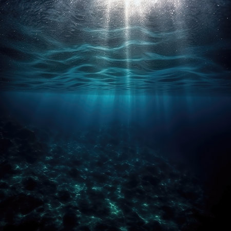 Underwater view of the sea with light rays coming from above.の素材