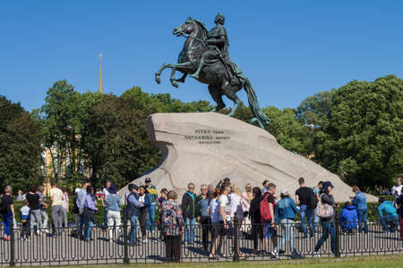 SAINT PETERSBURG, RUSSIA - JUNE 23, 2019: Tourists at the monument to Peter the Great