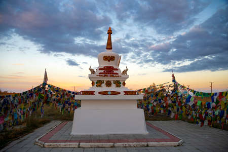 ELISTA, RUSSIA - SEPTEMBER 20, 2021: View of the stupa in the Buddhist temple of Shakyusn-syume against the background of a September sunset. Elista. Republic of Kalmykia, Russiaのeditorial素材