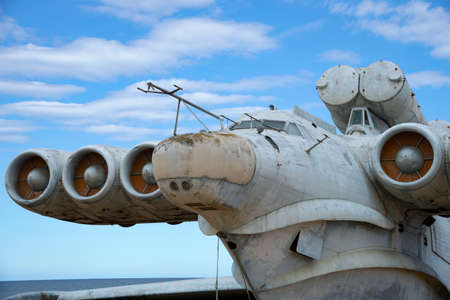 DERBENT, RUSSIA - SEPTEMBER 27, 2021: A fragment of the old abandoned rocket ship-ekranoplan "Lun" close-up. Surroundings of Derbent, Republic of Dagestanのeditorial素材
