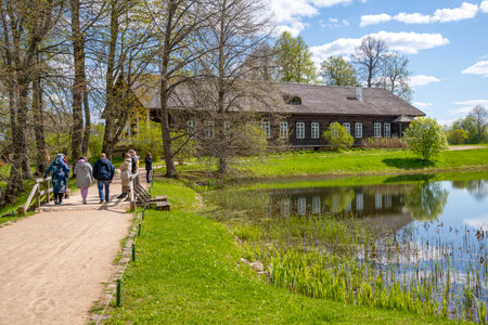 TRIGORSKOYE, RUSSIA - MAY 07, 2023: A group of tourists at the estate of the landowners Osipov-Wolf, Trigorskoye. Pushkin Mountainsのeditorial素材