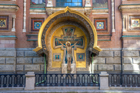 ST. PETERSBURG, RUSSIA - APRIL 03, 2022: A fragment of a mosaic with the crucifixion of Jesus Christ on the wall of the Cathedral of the Resurrection of Christ (Savior-on-Blood). Saint Petersburgのeditorial素材