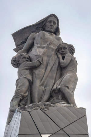 LENINGRAD REGION, RUSSIA - FEBRUARY 10, 2024: Memorial to Soviet civilians (victims of the Nazi Genocide) during a snowfall. Russiaのeditorial素材