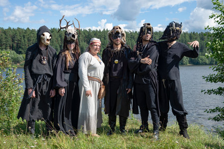TVER REGION, RUSSIA - JULY 22, 2023: Girl in a medieval costume with a group of YARuGA