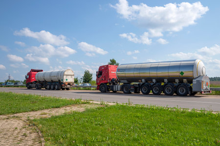 DOROGOBUZH, RUSSIA - JULY 13, 2024: Chemical tanker trucks. Dorogobuzh, Smolensk region, Russia
