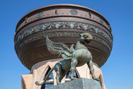 KAZAN, RUSSIA - SEPTEMBER 01, 2024: Sculpture of a winged leopard on the background of the Kazan Family Center. Republic of Tatarstan, Russiaのeditorial素材