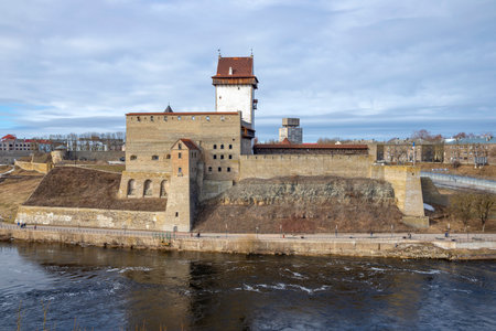 Herman's ancient castle on the river bank. Narva, Estoniaのeditorial素材