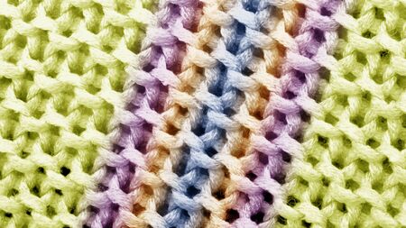Bright colored stripes on knitted fabricの写真素材